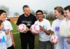 Lineker kicks off cancer fund-raiser Gary Lineker with children from Carew Manor