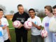 Lineker kicks off cancer fund-raiser Gary Lineker with children from Carew Manor