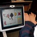 Using a communication device to say “goodbye”.