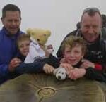 Genny and fund-raisers top one of the three peaks.