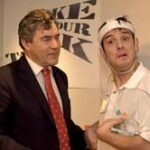 Simon receives his Enterprising Young Brit Award from Gordon Brown in 2004.