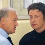 John D’Abbro (left) shares a moment with Jamie Oliver during filming for Dream School.