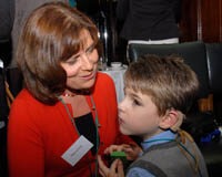 Intervenors needed for deafblind kids Actress Rebecca Front with seven-year-old Sam Cowell, who was born deafblind.