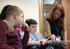 Transition support for Duchenne Takin' Charge Manager Dr Janet Hoskin with young people with Duchenne.