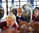 Children can experiment with instruments to create different moods.