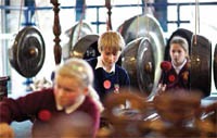 Children can experiment with instruments to create different moods.