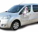 Placing the wheelchair-user next to the driver can create a more sociable and dignified experience.