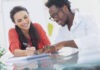 How should professionals work together?