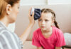 Supporting children with dyspraxia child with dyspraxia who got hurt being comforted by her mother