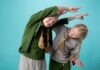 Autistic children benefit from dance movement psychotherapy Two girls with long blonde plaits playing together