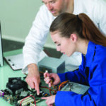 Student learning to repair computer