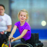 SEN116 – Girl in a Wheelchair Playing Sports