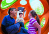 How can inclusive playgrounds support children’s play values and inclusive experiences?