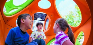 How can inclusive playgrounds support children’s play values and inclusive experiences?
